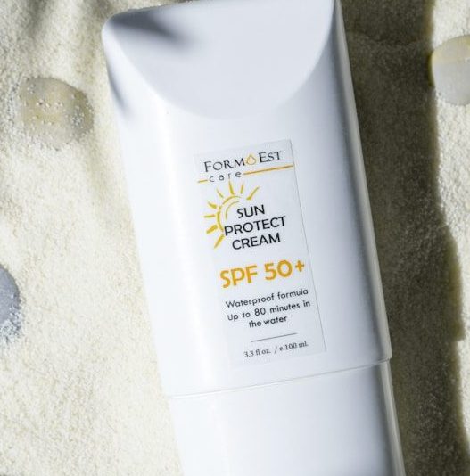 a white box with a yellow label on a white surface